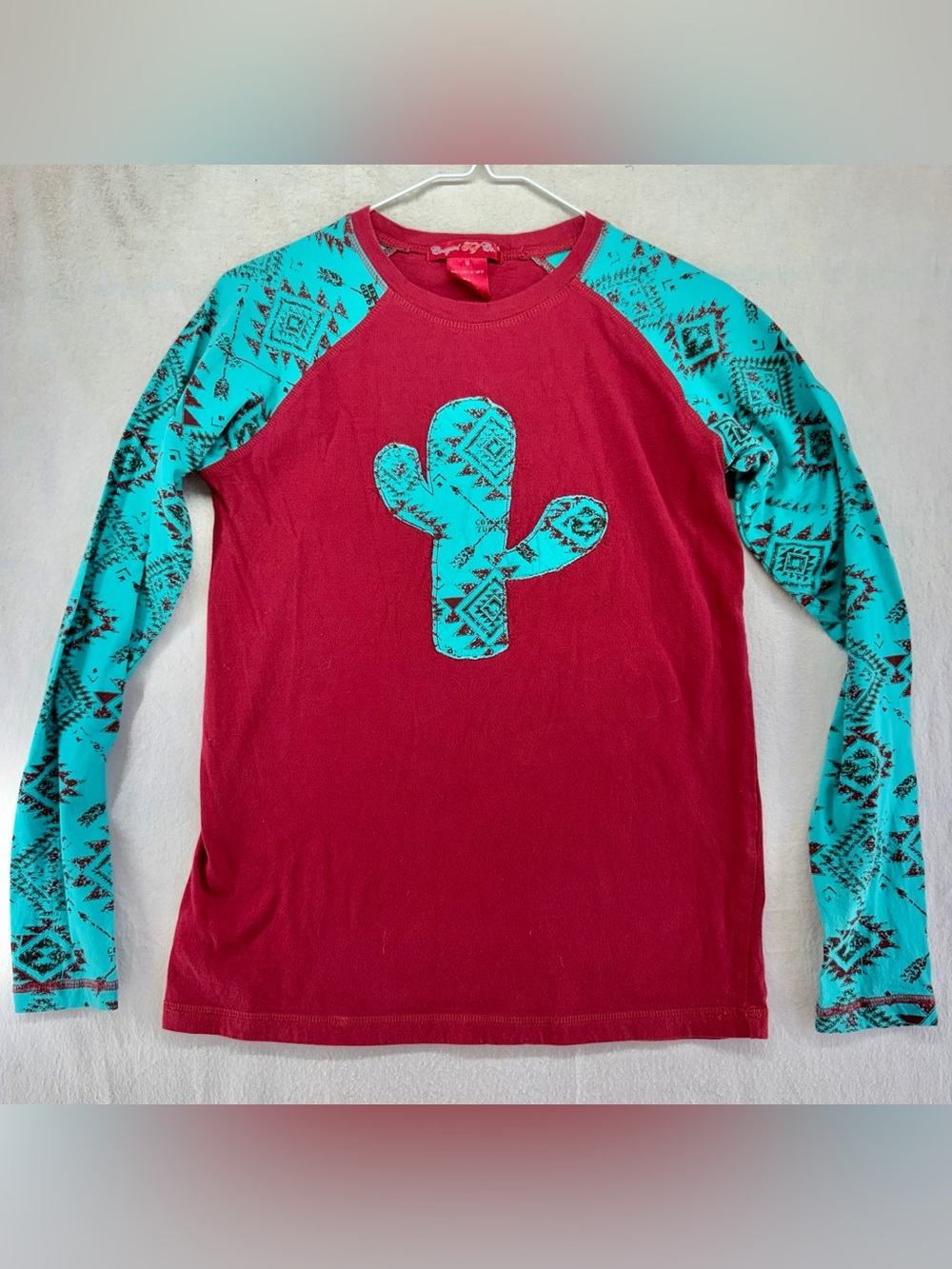 Cowgirl Tuff Red Long-Sleeve Raglan Top with Turquoise Aztec Cactus